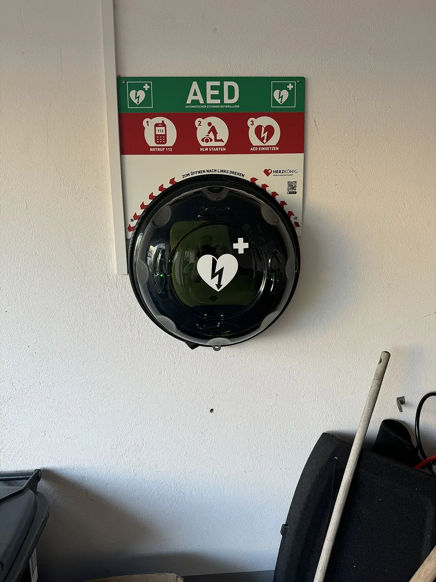 Wall-mounted automated external defibrillator