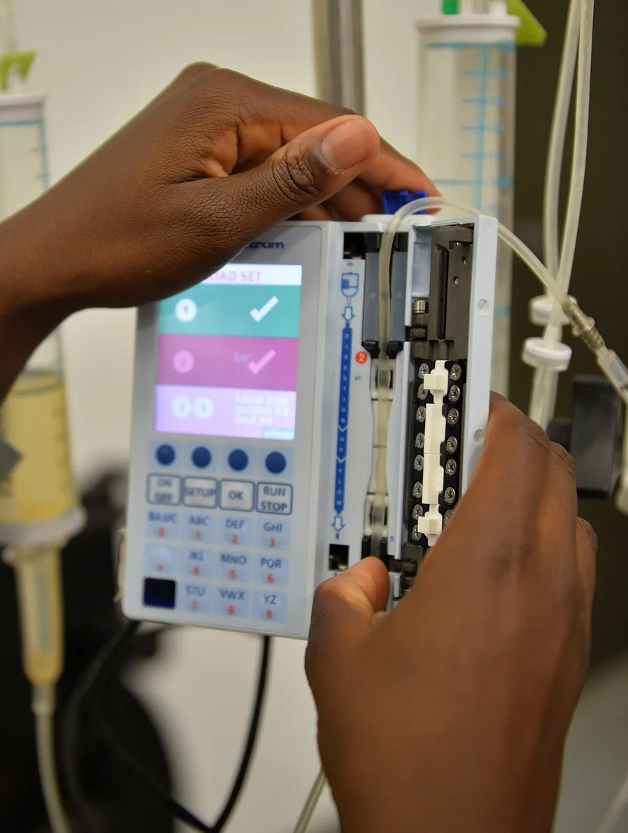 Technician testing an infusion pump