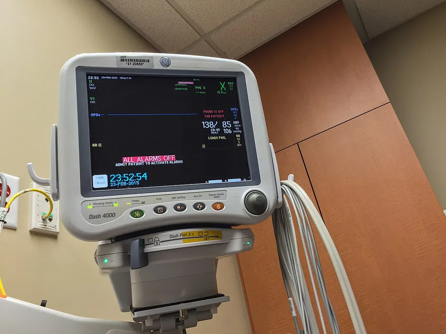 Wall-mounted patient vital-signs monitor