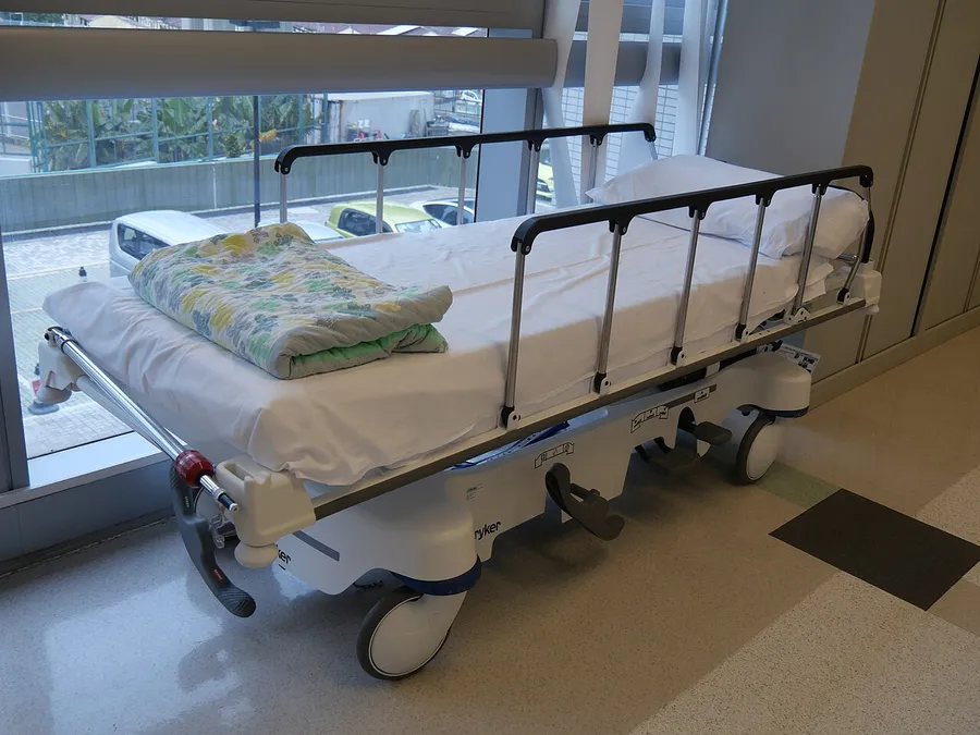 Wheeled patient transport stretcher